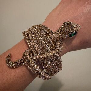 Gold Snake Bracelet with Green Eyes